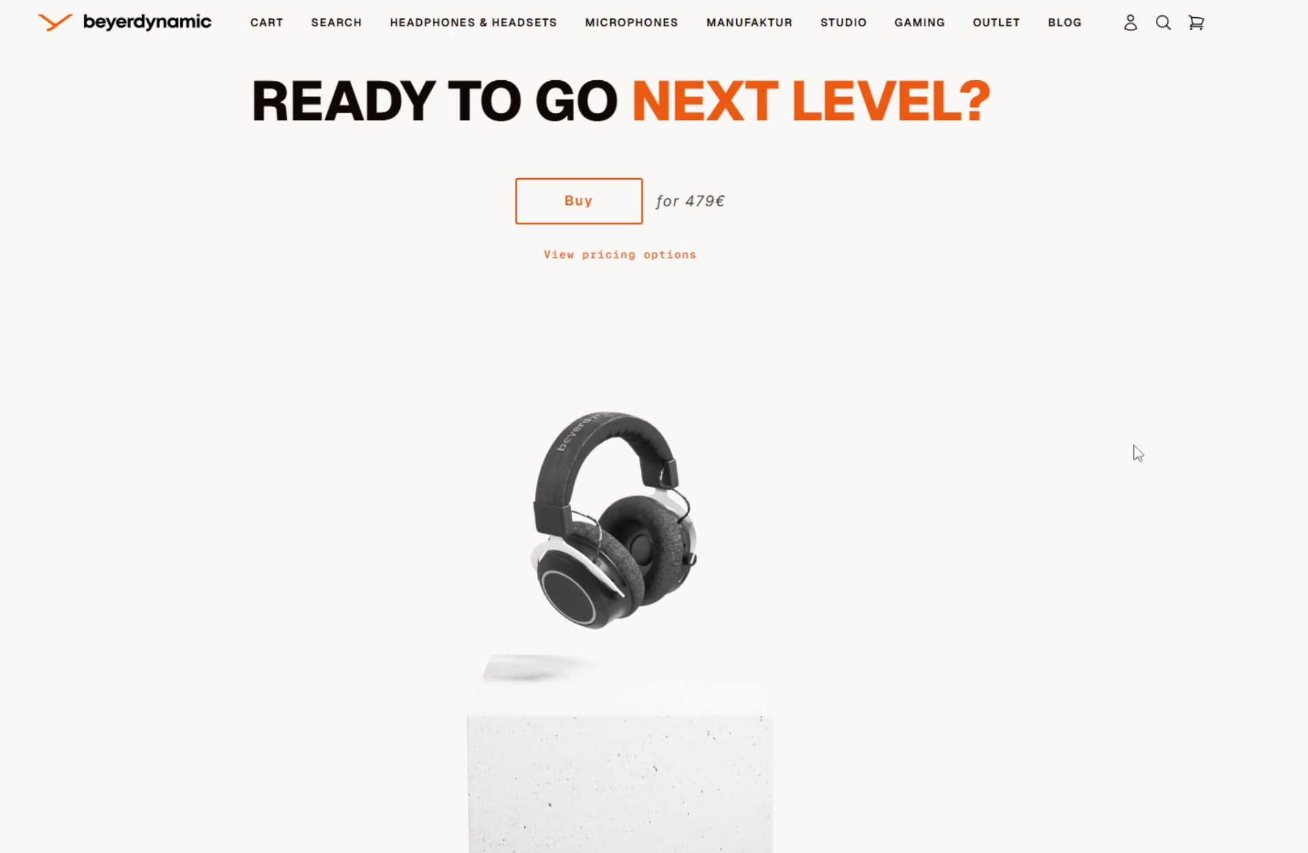 Black wireless headphones floating above the podium with text saying READY TO GO NEXT LEVEL?
